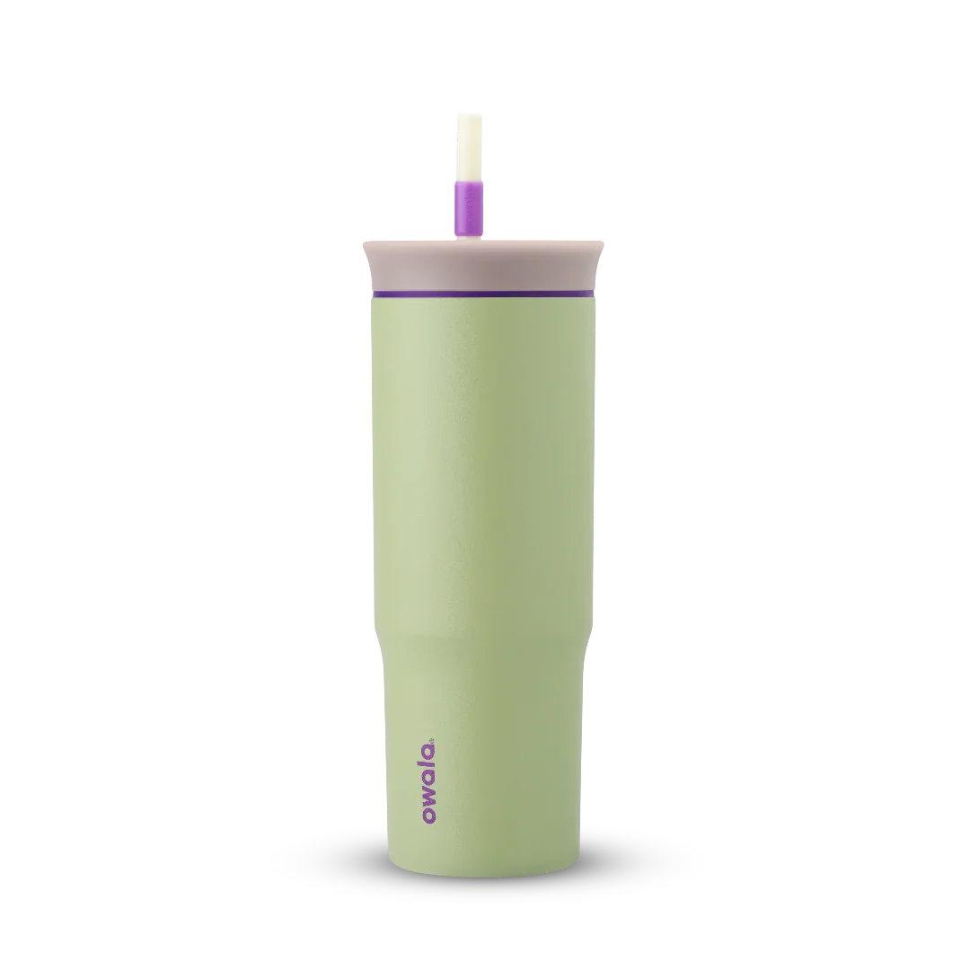 Owala green 710ml tumbler with a purple lid and straw