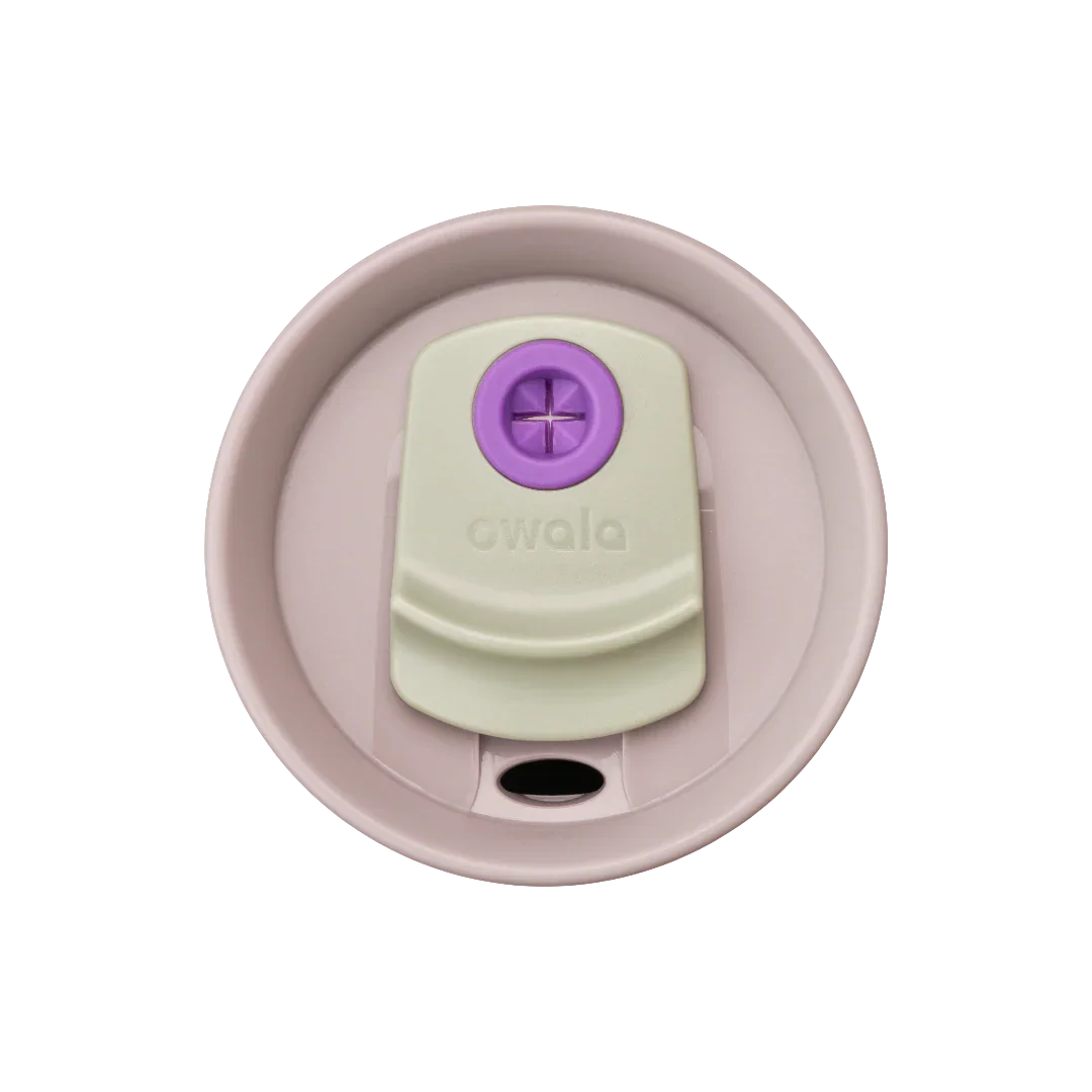 Owala green 710ml tumbler with a purple lid and straw top down shot