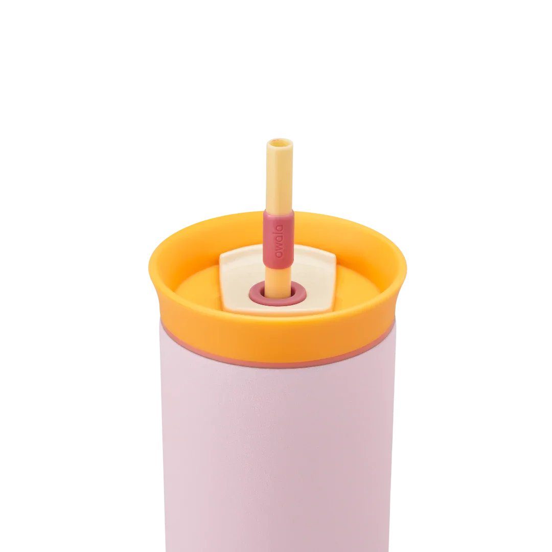 Owala pink 710ml tumbler with a yellow lid and straw close up shot of lid