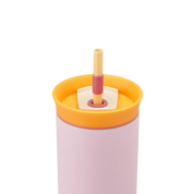 Owala pink 710ml tumbler with a yellow lid and straw close up shot of lid