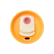 Owala pink 710ml tumbler with a yellow lid and straw top down shot of lid