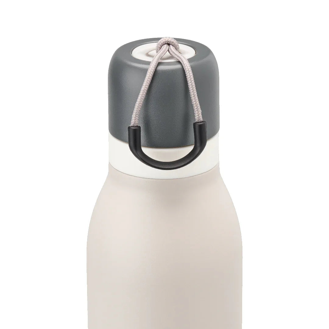 Owala beige freesip twist bottle 535ml with dark lid closeup shot of lid