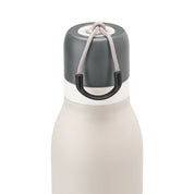 Owala beige freesip twist bottle 535ml with dark lid closeup shot of lid