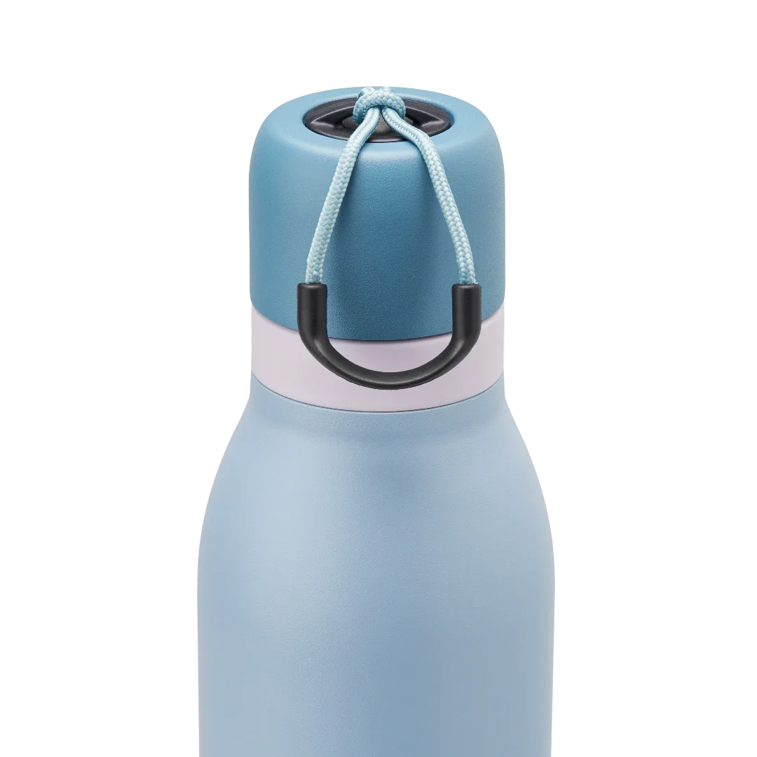 Owala blue freesip twist bottle 535ml with blue lid closeup shot of lid