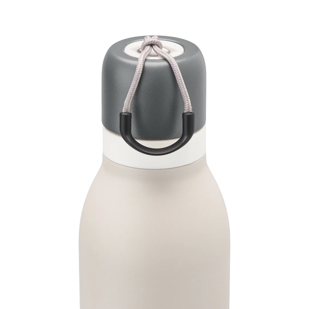 Owala beige freesip twist bottle 710ml with dark lid closeup shot of lid