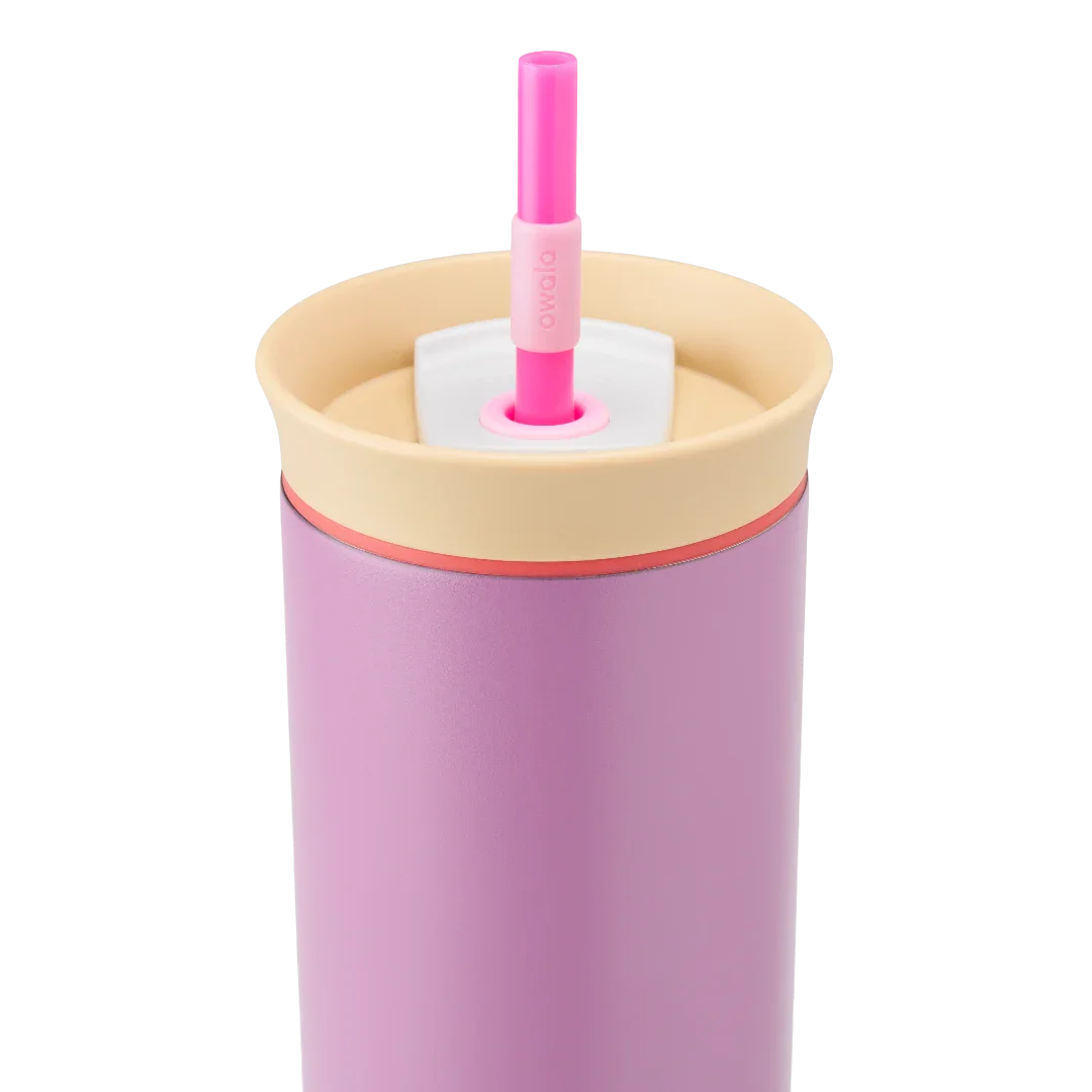 Owala purple tumbler with a beige lid and pink straw close up shot of lid
