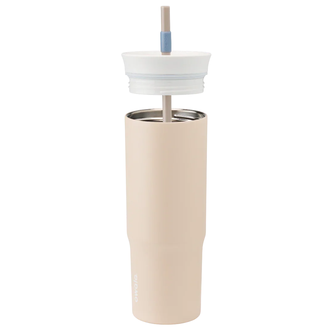 Owala beige 710ml tumbler with a white lid and straw lid half off