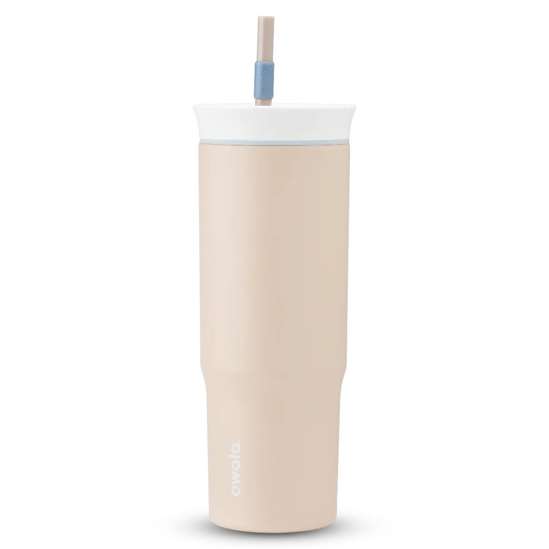 Owala beige 710ml tumbler with a white lid and straw