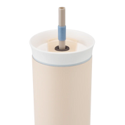 Owala beige 710ml tumbler with a white lid and straw close up shot