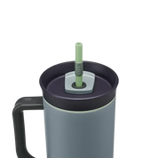 Owala stainless steel insulated tumbler with handle and straw 1185ml light blue base with dark lid close up shot