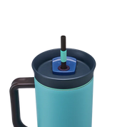 Owala stainless steel insulated tumbler with handle and straw 1185ml bright blue base with dark lid close up shot